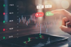 stock-exchange-market-concept-hand-touching-trading-icon-screen-with-graphs-analysis-candle-line-bokeh-colors-light_2034-2795 (1)